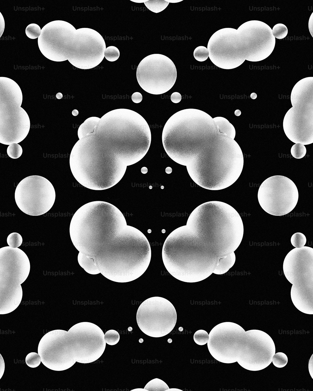 Une photo en noir et blanc de bulles de savon
