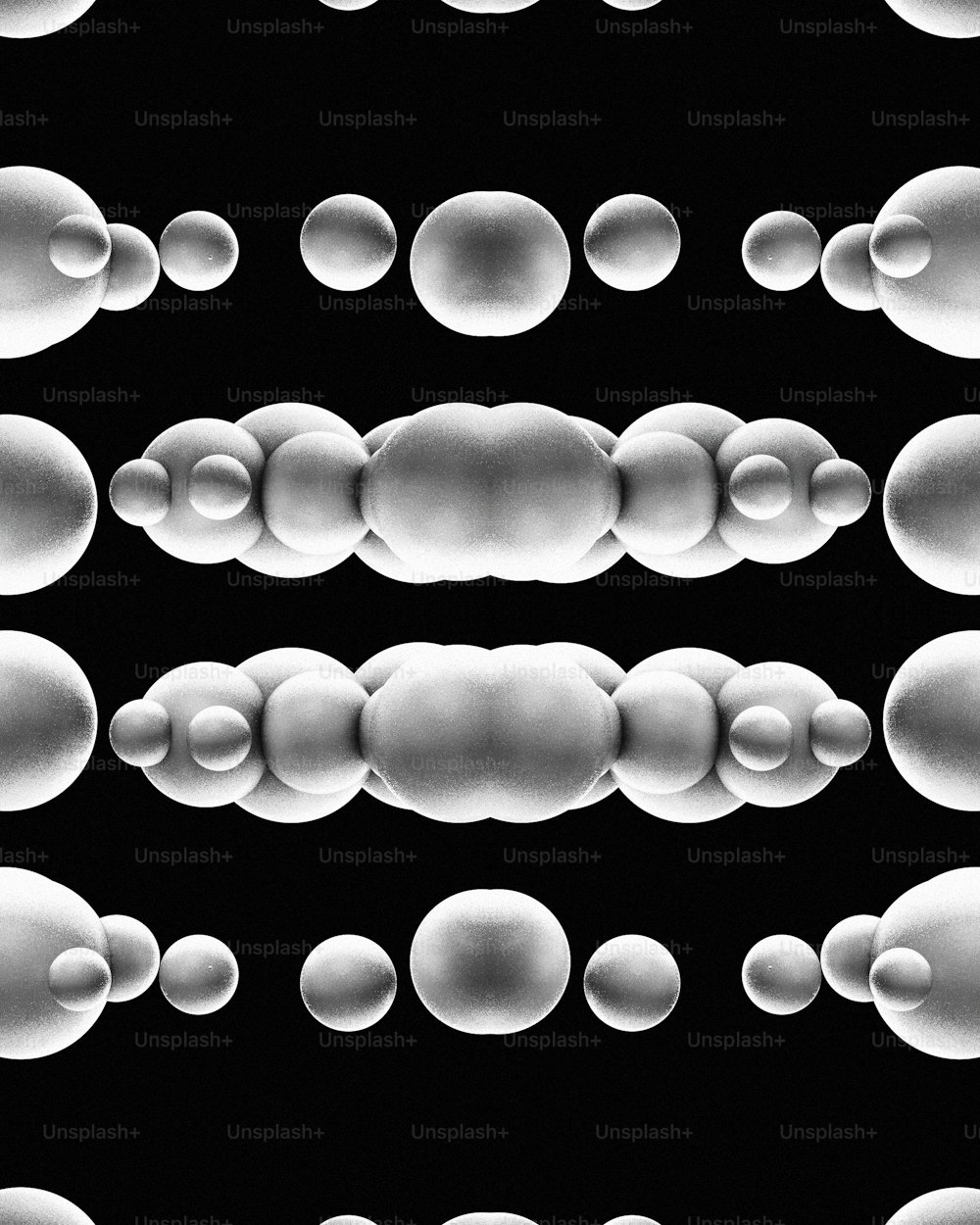 a black and white photo of a bunch of bubbles