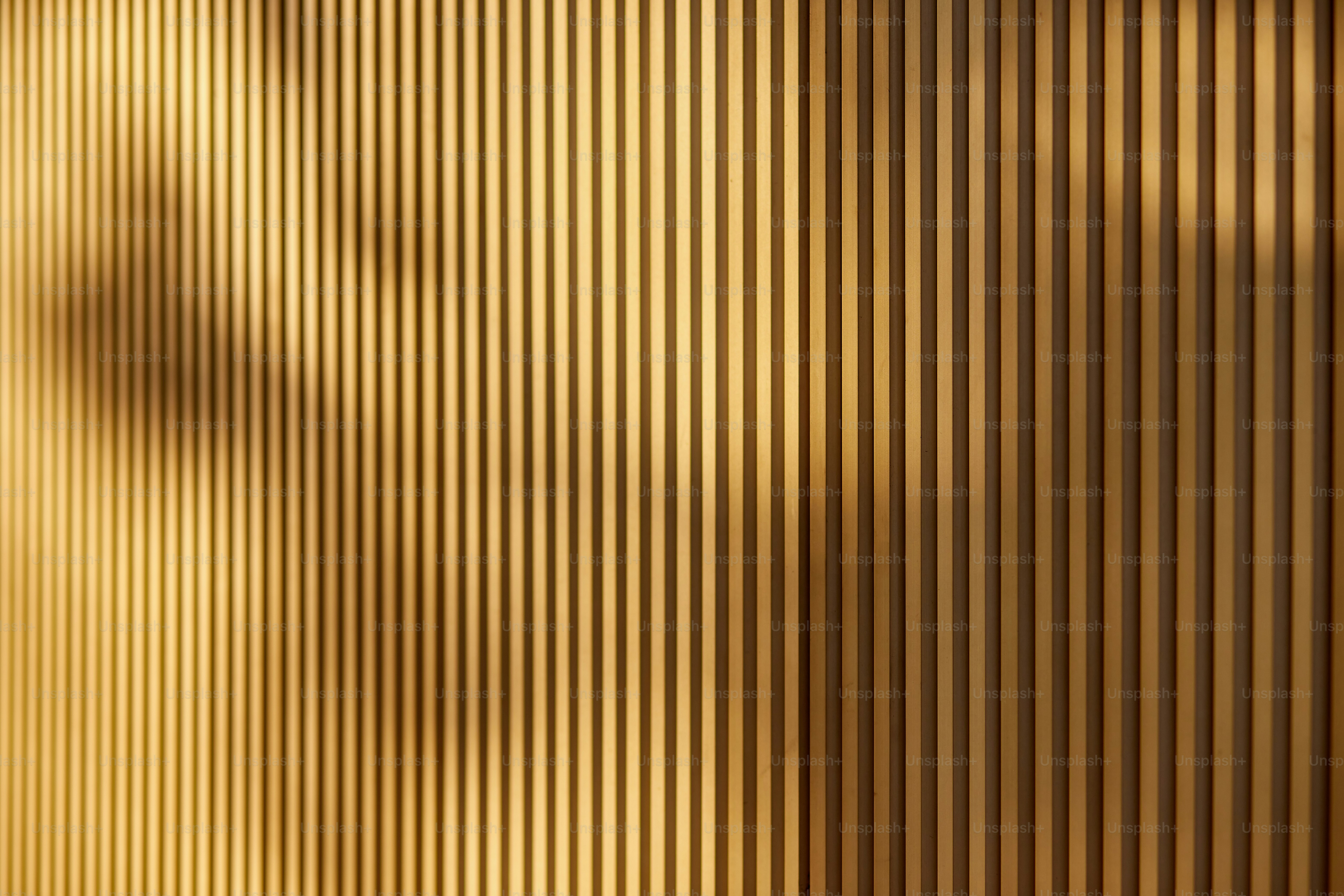 the shadow of a clock on a wall