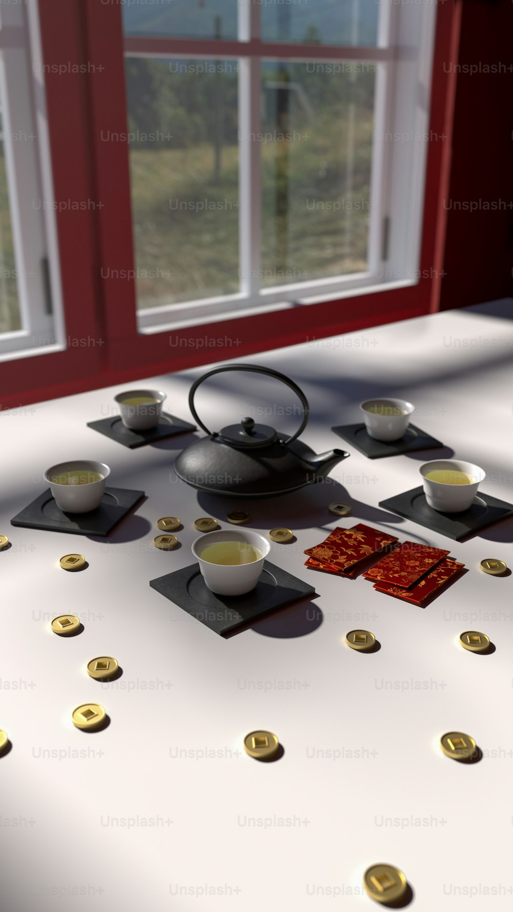 a table with a tea set and cups on it