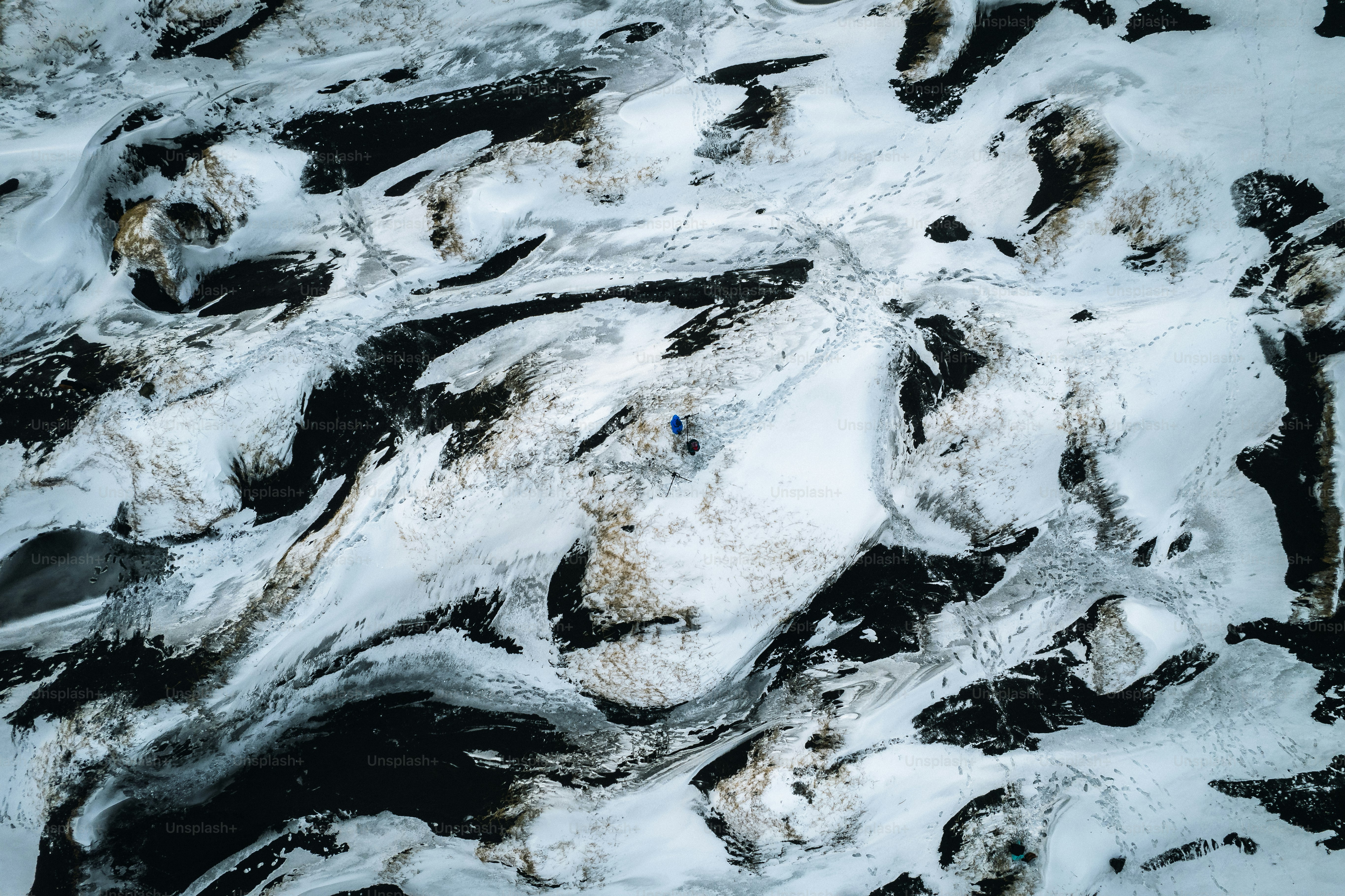 An aerial view of a snow covered mountain photo – Iceland Image on Unsplash