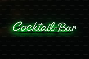 Un'insegna al neon che recita cocktail bar