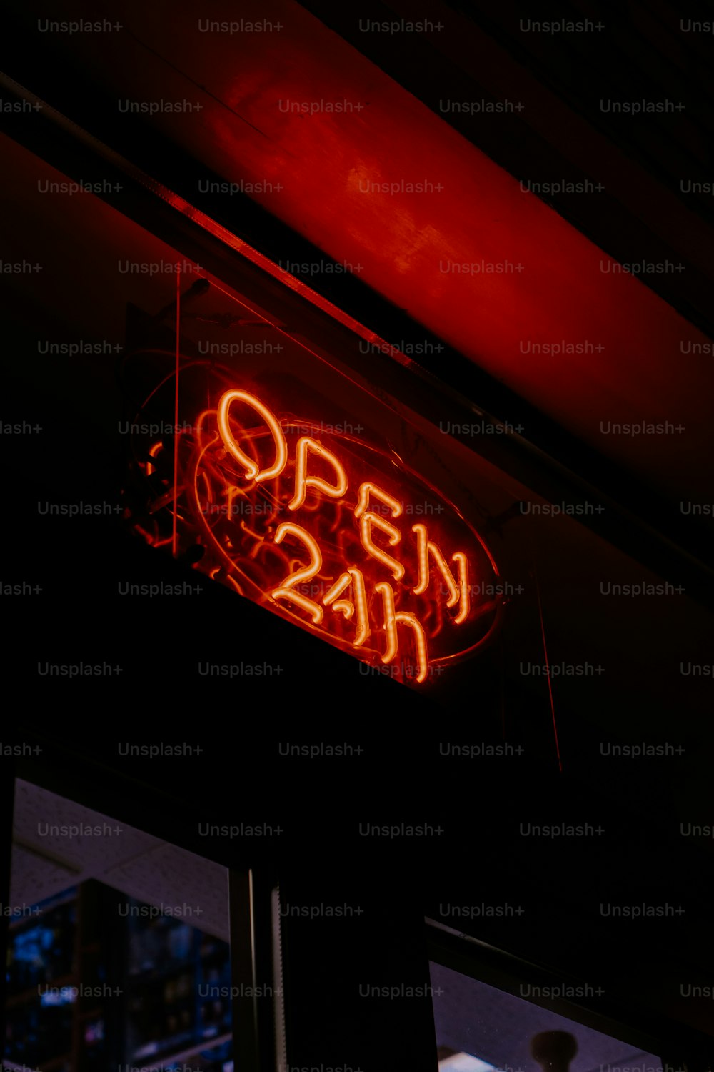 a neon sign that reads open 24h