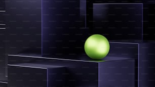 a green ball sitting on top of a shelf