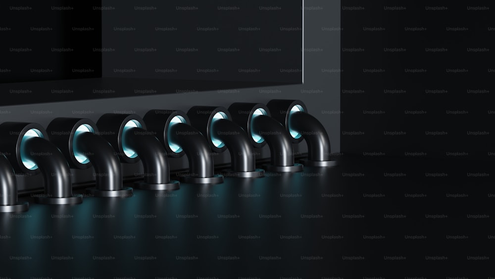 a row of black lavatorys with blue lights on them