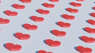 a lot of red hearts on a white surface