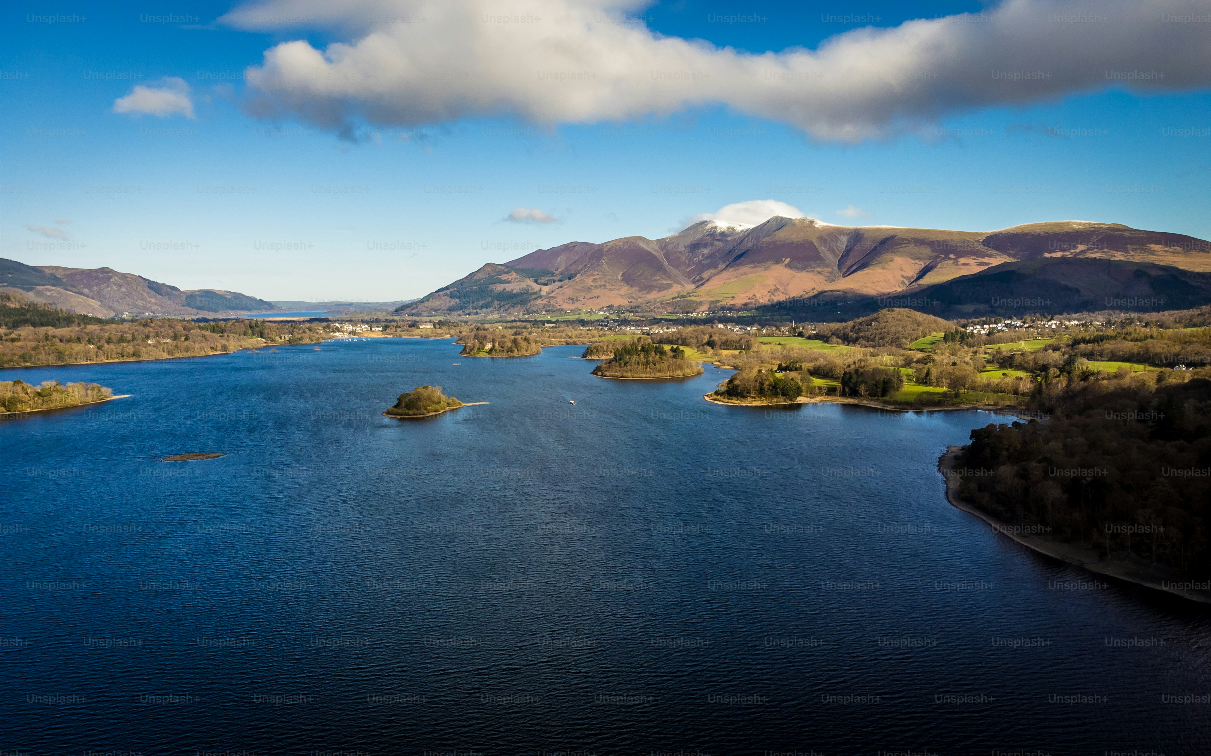 a large body of water surrounded by mountains