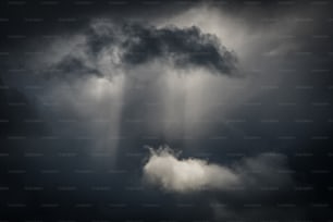 a black and white photo of a storm cloud