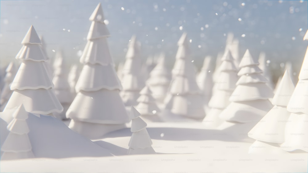 雪の中の白いクリスマスツリーのグループ
