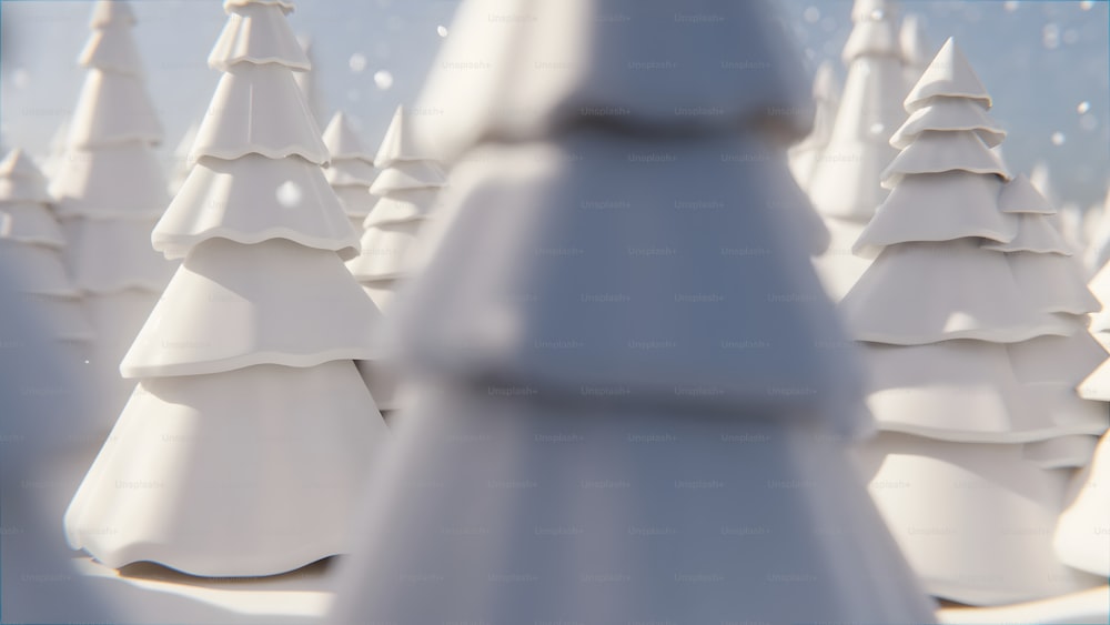 a group of white trees with snow on them