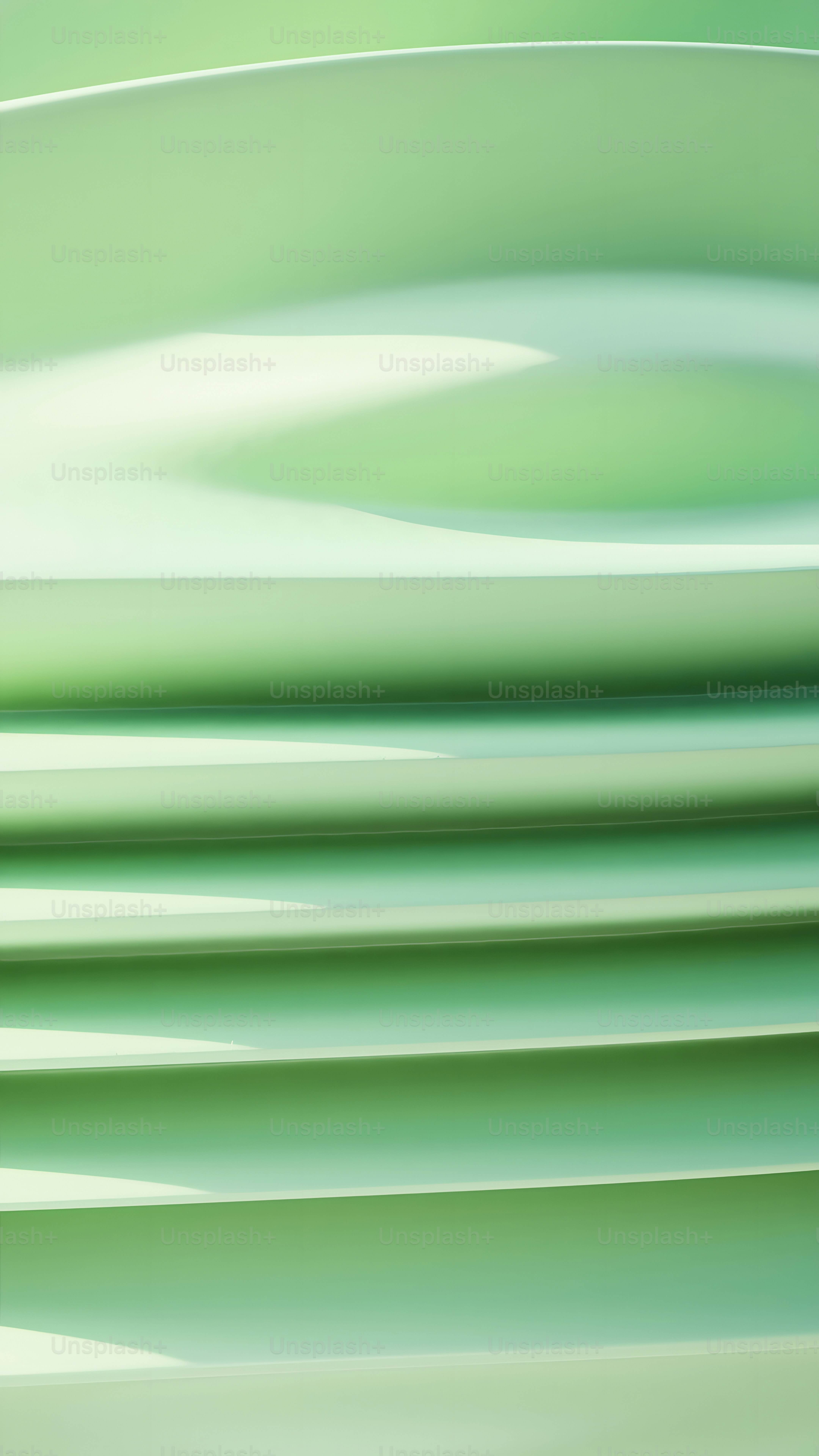 a stack of green plates stacked on top of each other