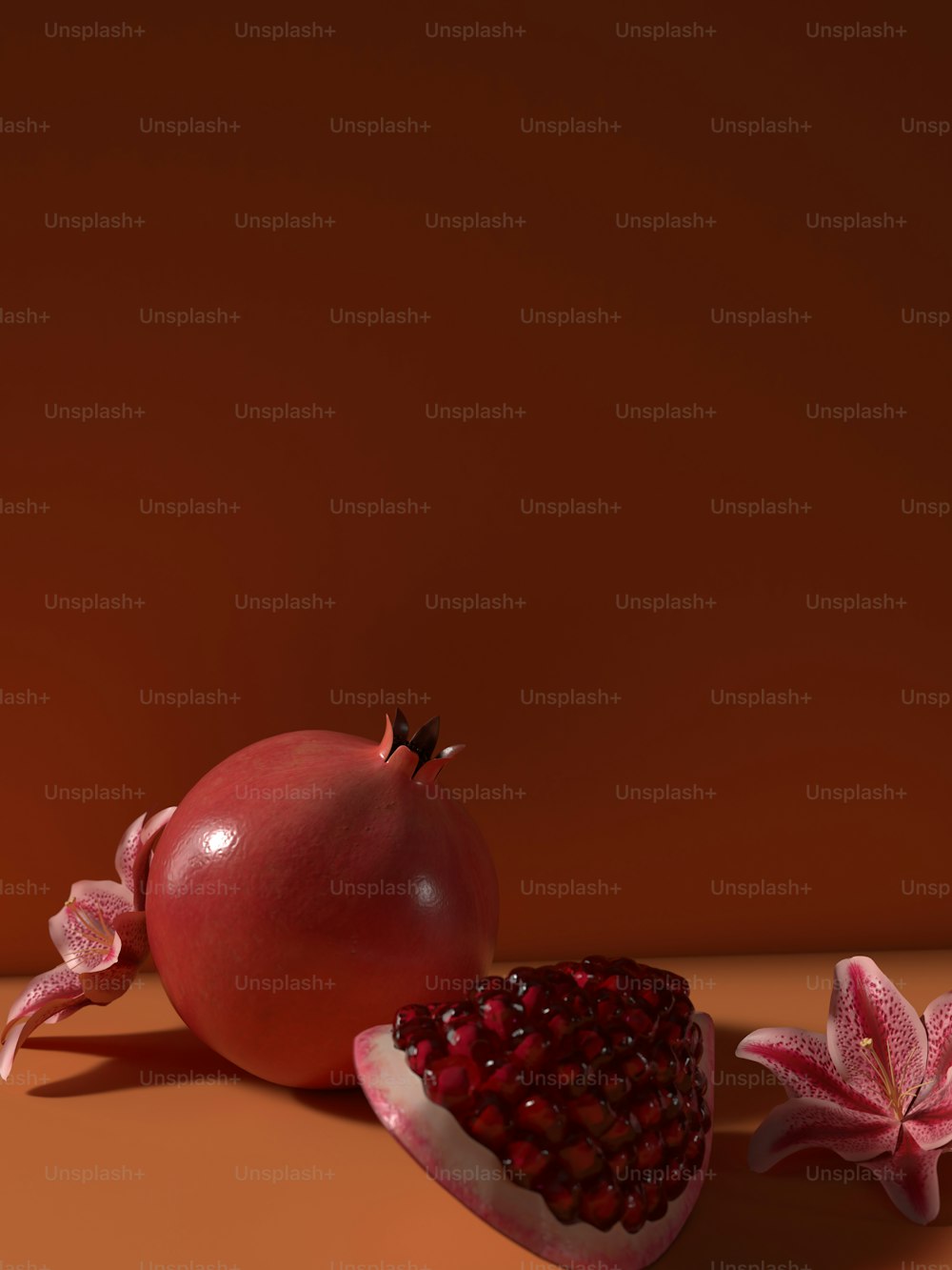a pomegranate and a flower on a table