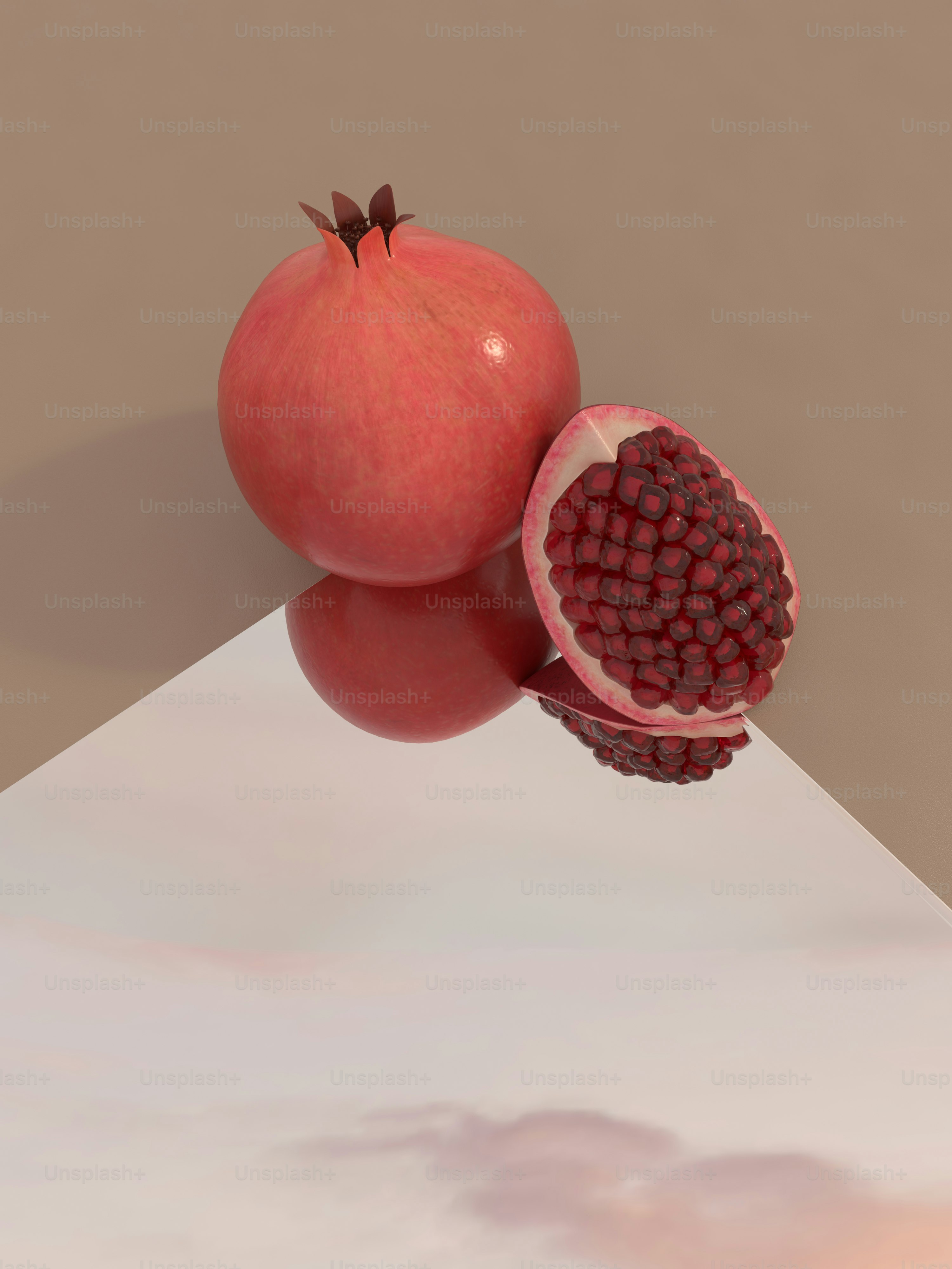 a pomegranate and a piece of fruit on a table