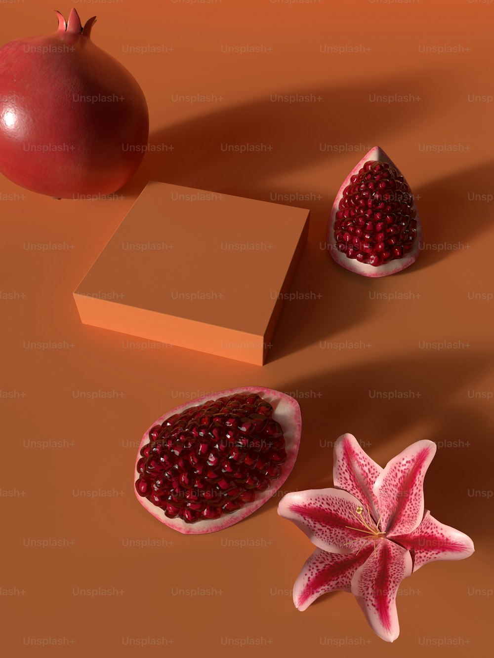 a pomegranate and a piece of paper on a table