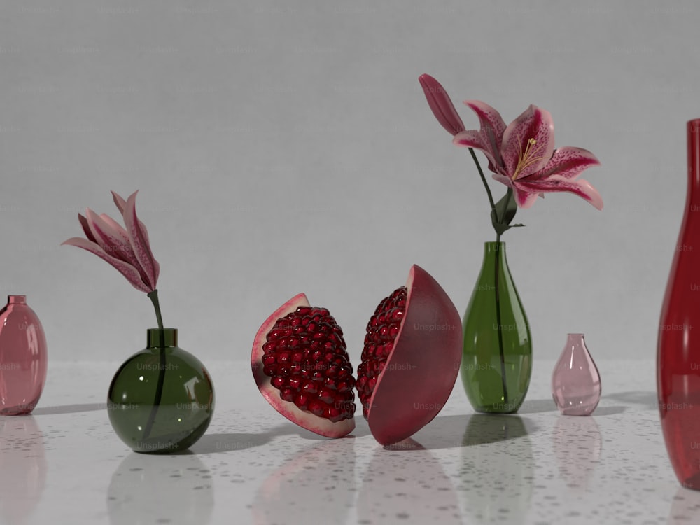 um grupo de vasos com flores neles