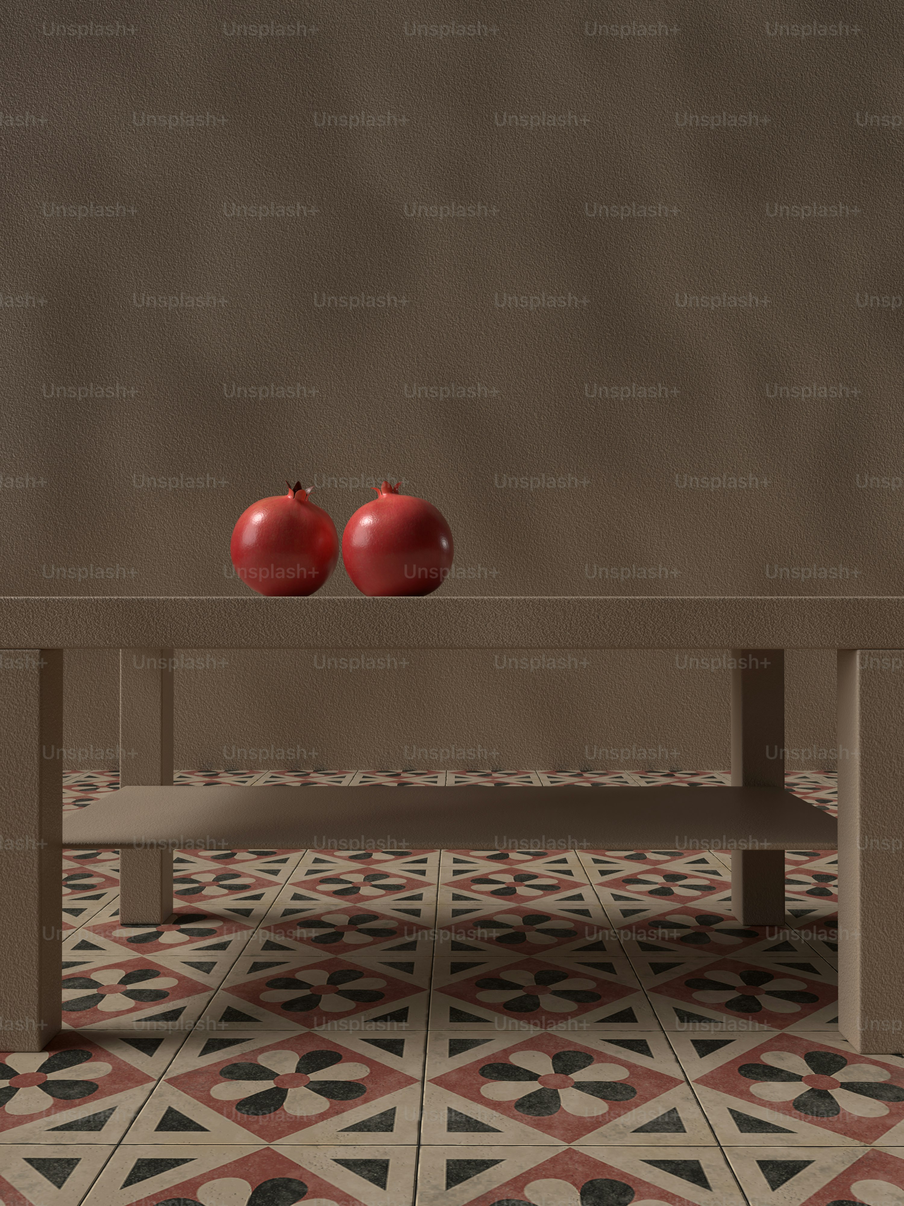 two red apples sitting on top of a wooden table