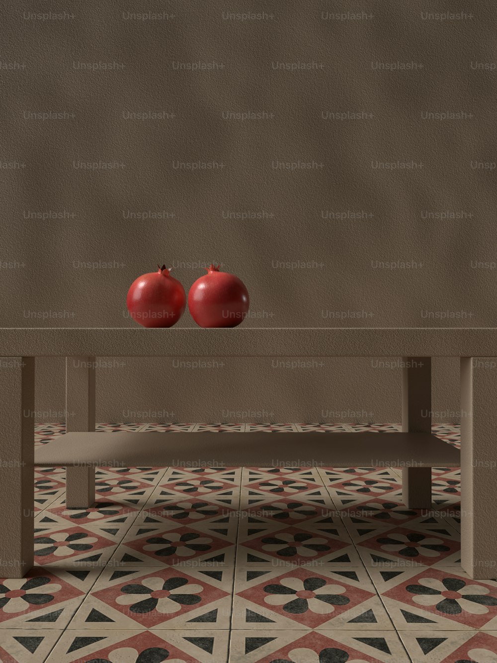 two red apples sitting on top of a wooden table