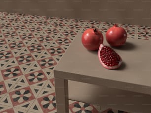 two pomegranates are sitting on a table