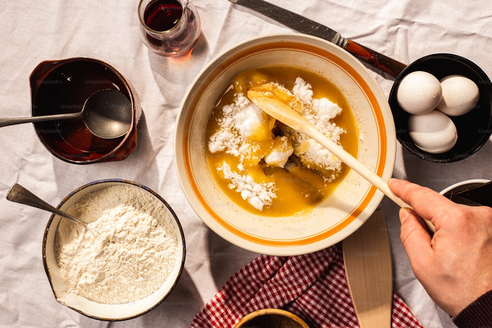 a bowl of food with a spoon in it