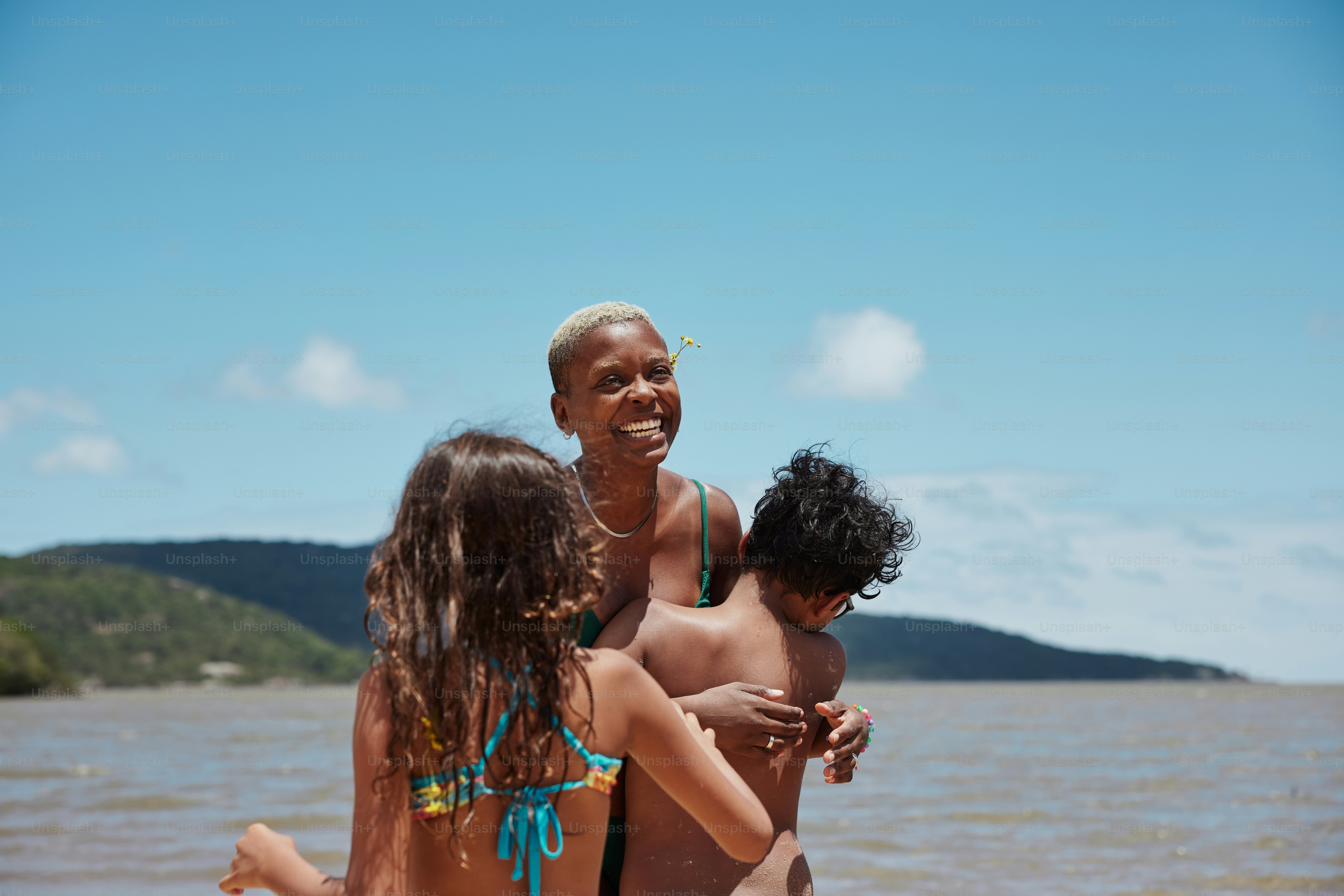a group of people that are standing in the water