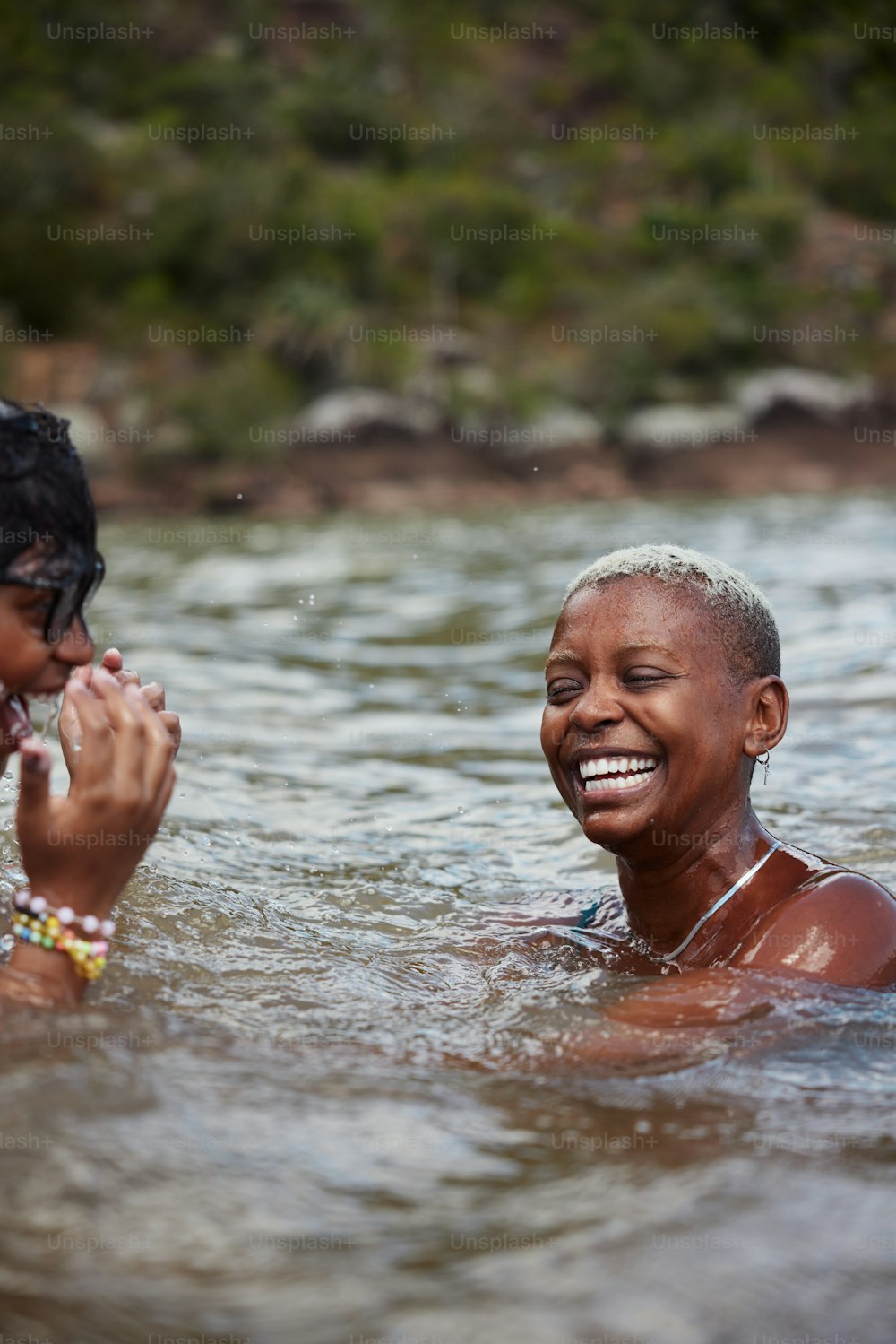 a couple of people that are in the water