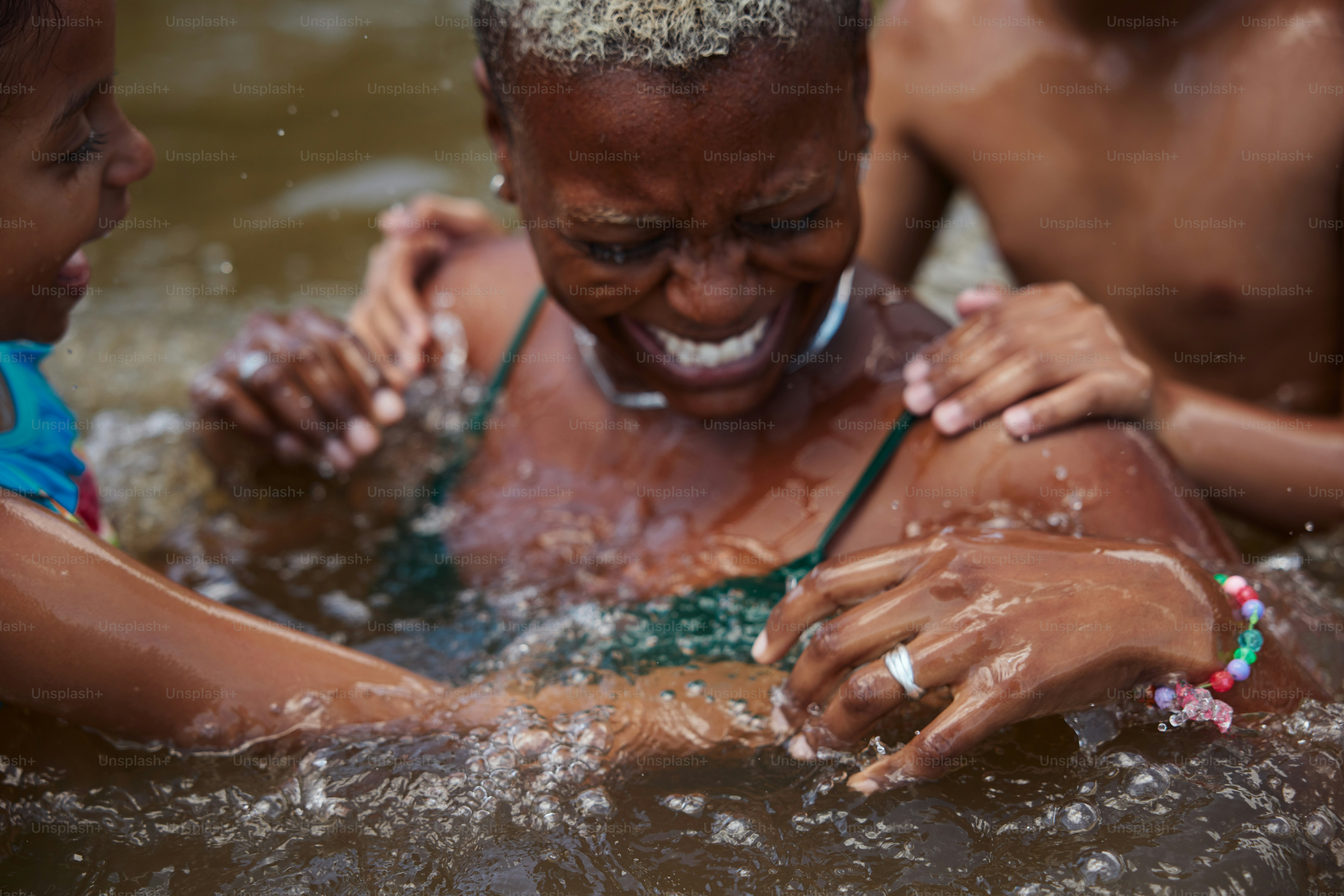 a group of people in a body of water