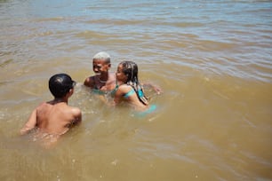 a group of people in a body of water