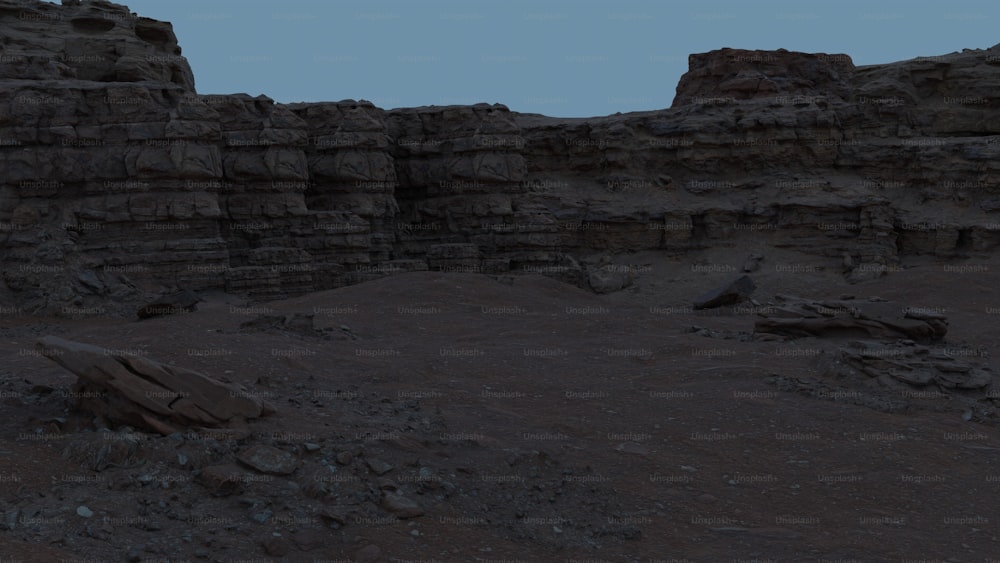 a rock outcropping in the middle of a desert