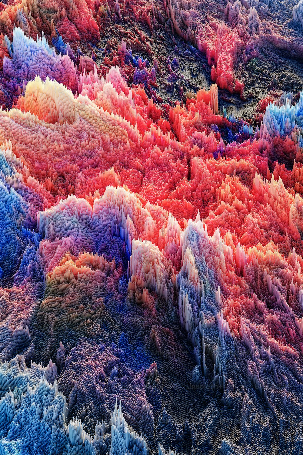 Un grand groupe de roches colorées avec un ciel en arrière-plan