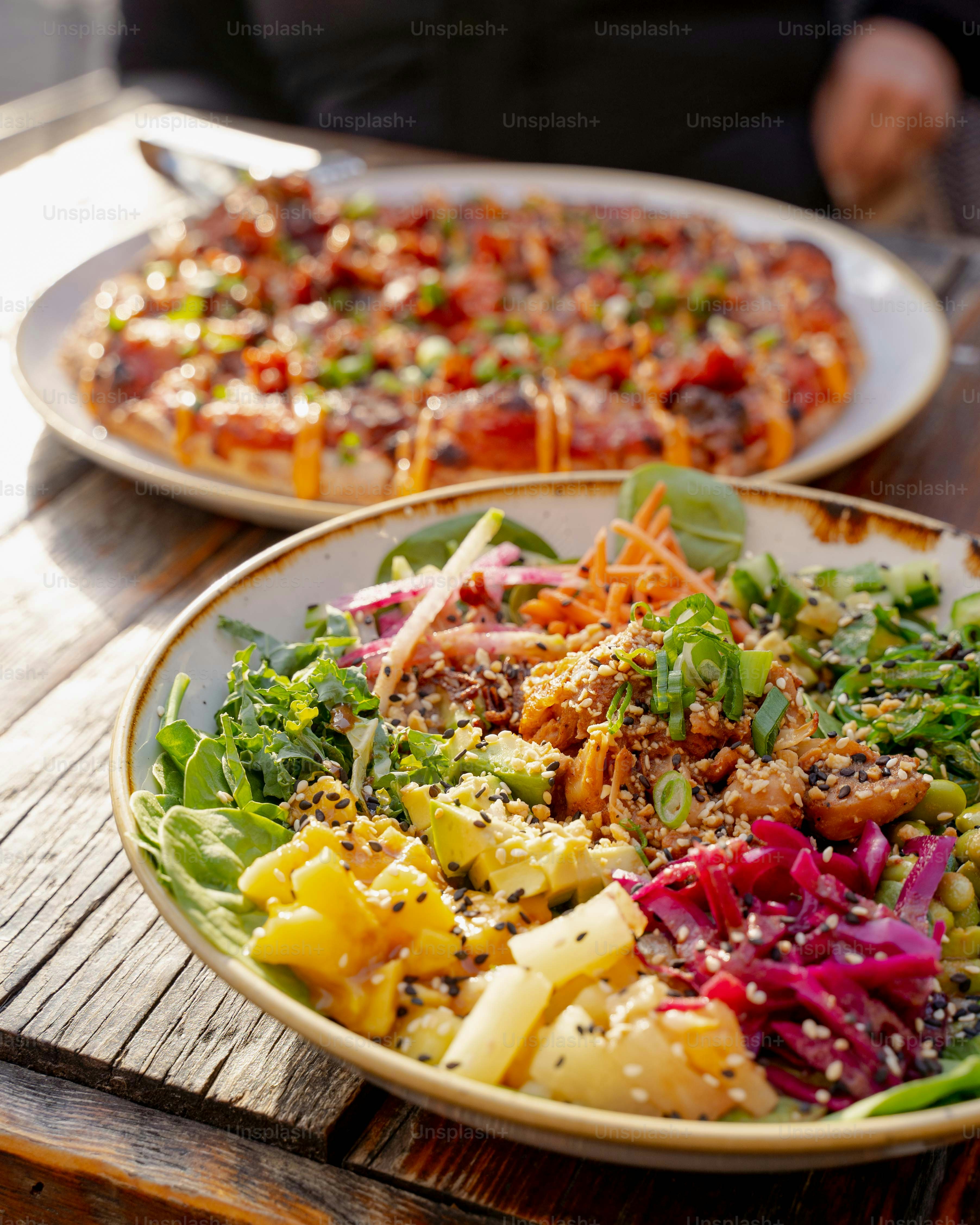 a couple of plates of food on a table