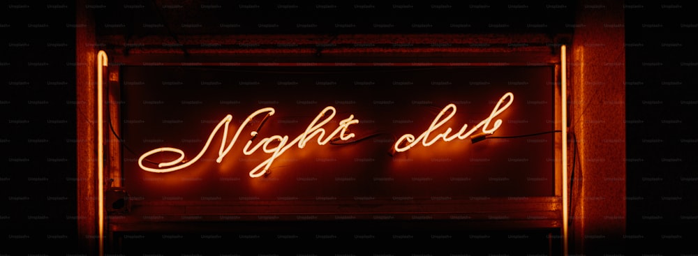 a neon sign that reads night club