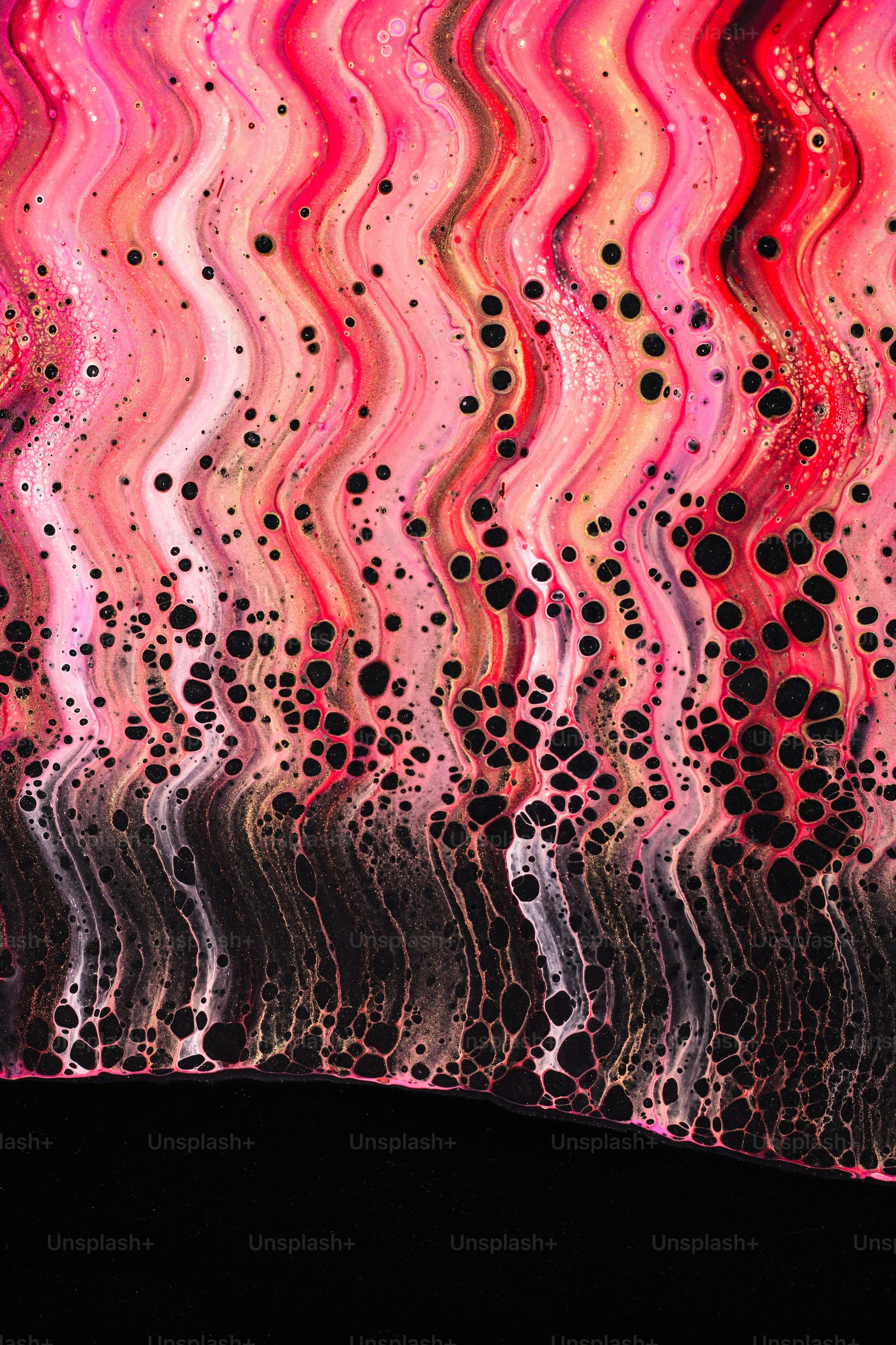 a close up of a glass window with a black background