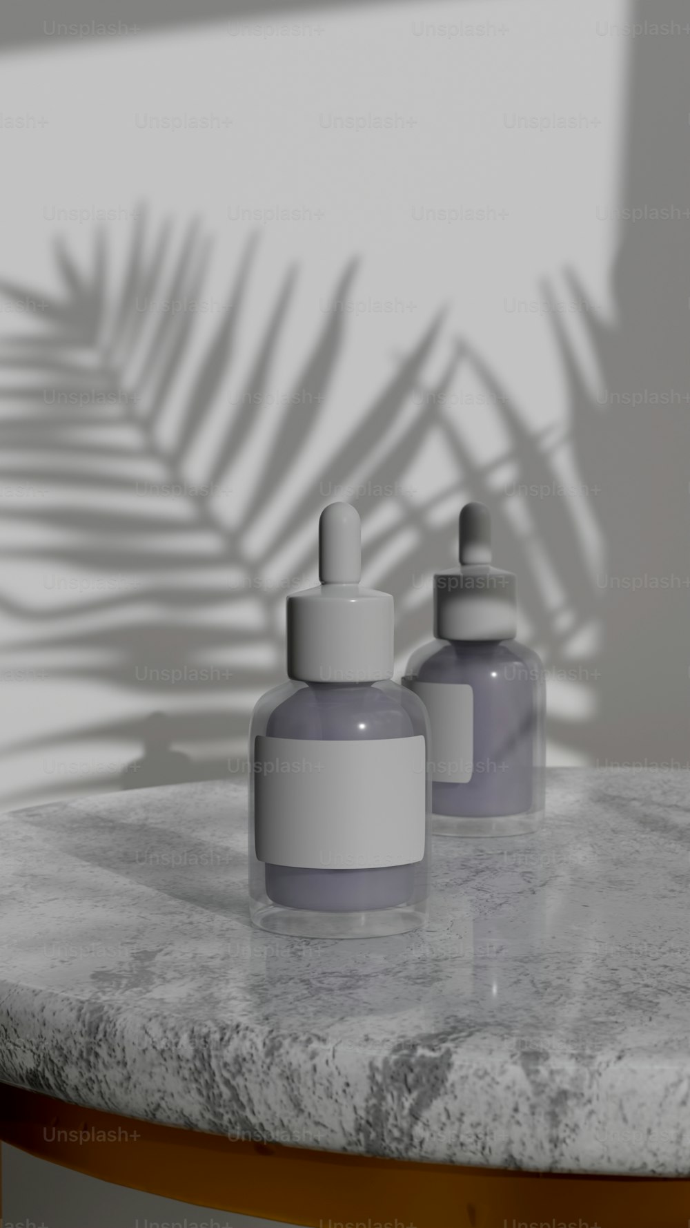 three bottles sitting on top of a marble table