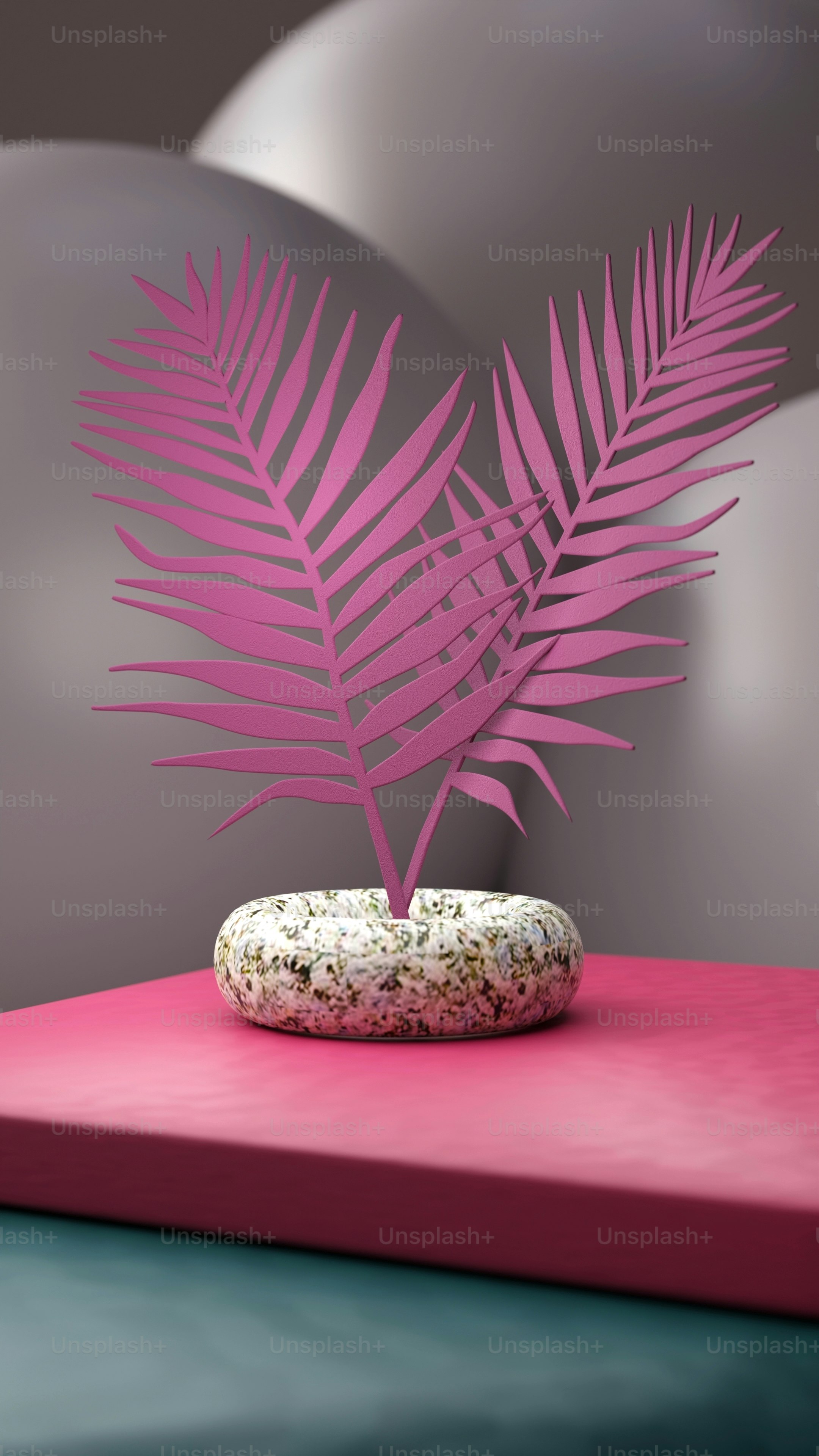 a donut sitting on top of a pink table