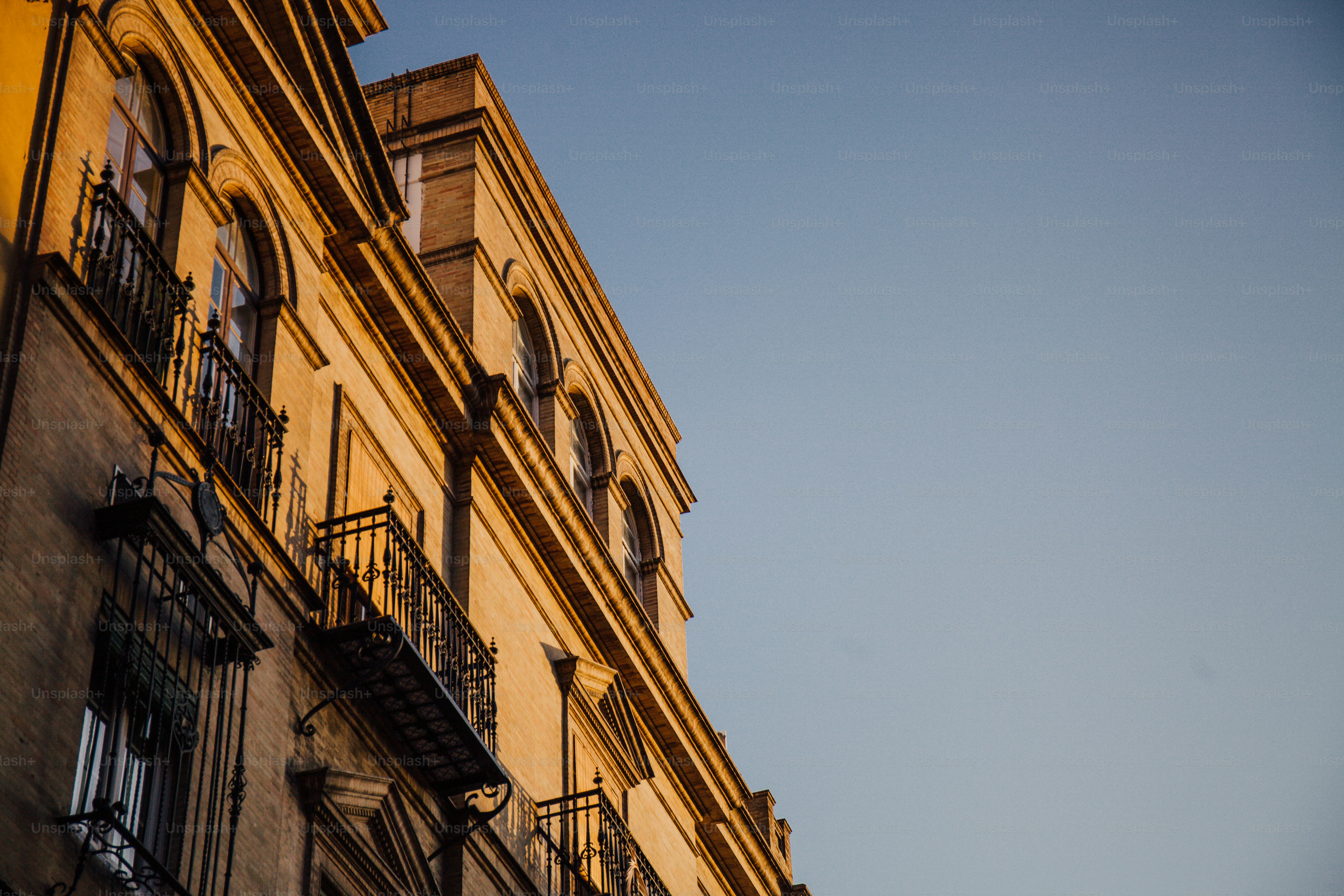 a tall building with balconies and balconies on it