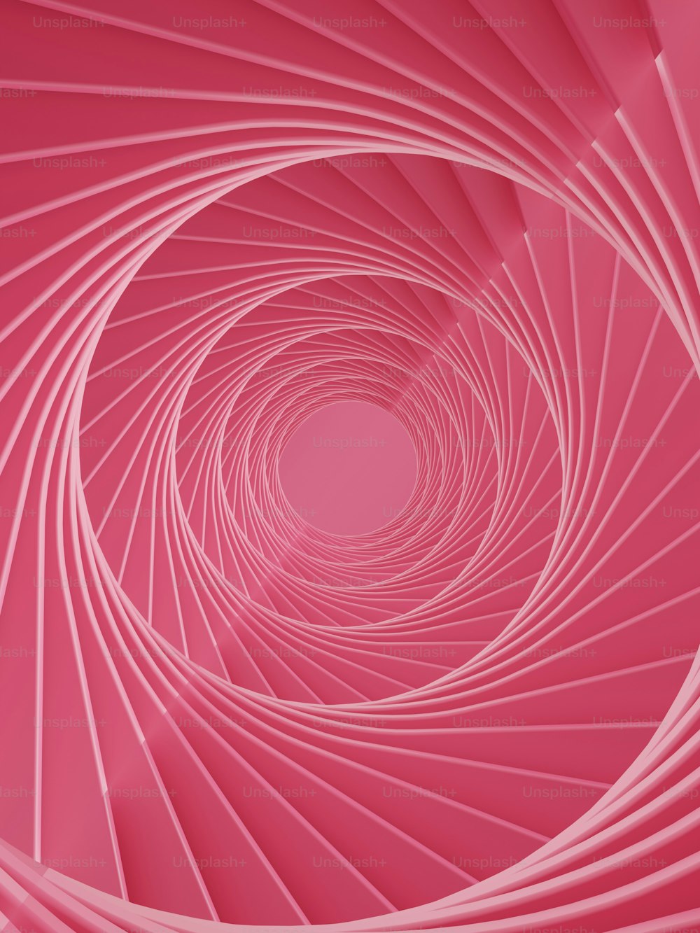 a pink background with a spiral design in the center