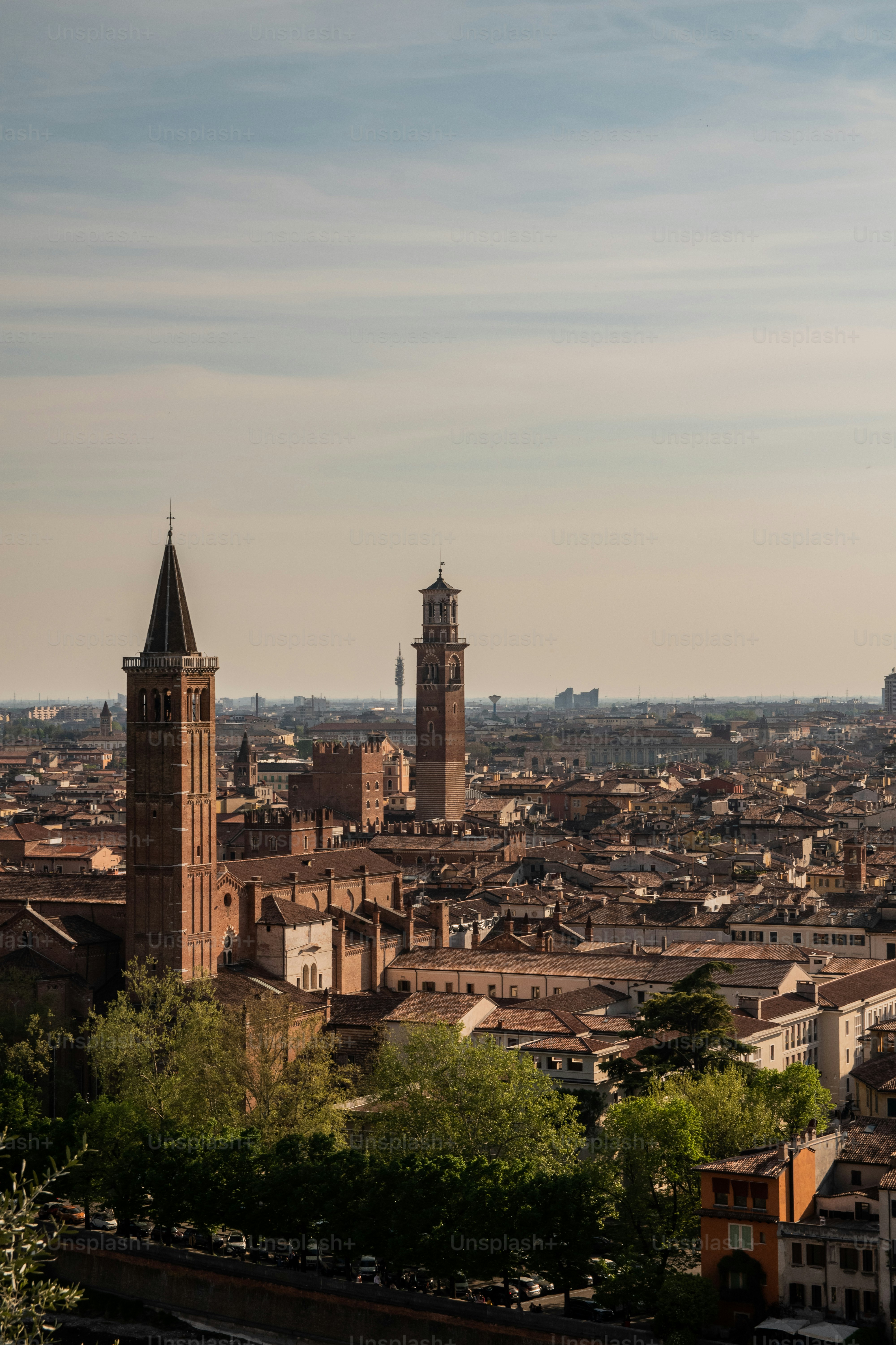 a view of a city with tall buildings and a clock tower