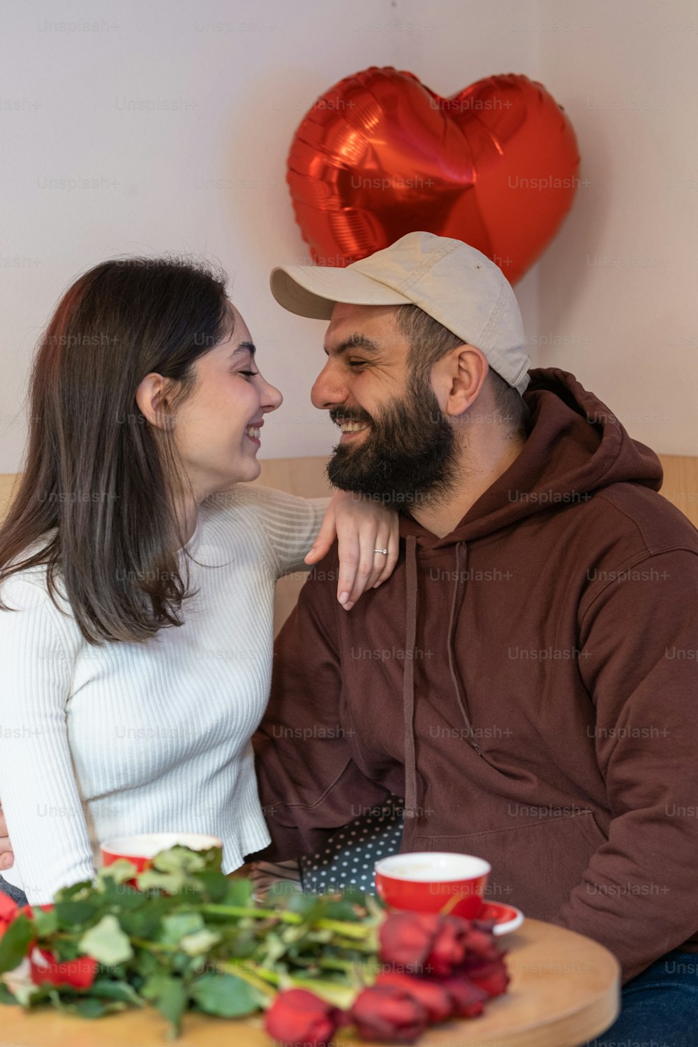 a man and a woman sitting next to each other