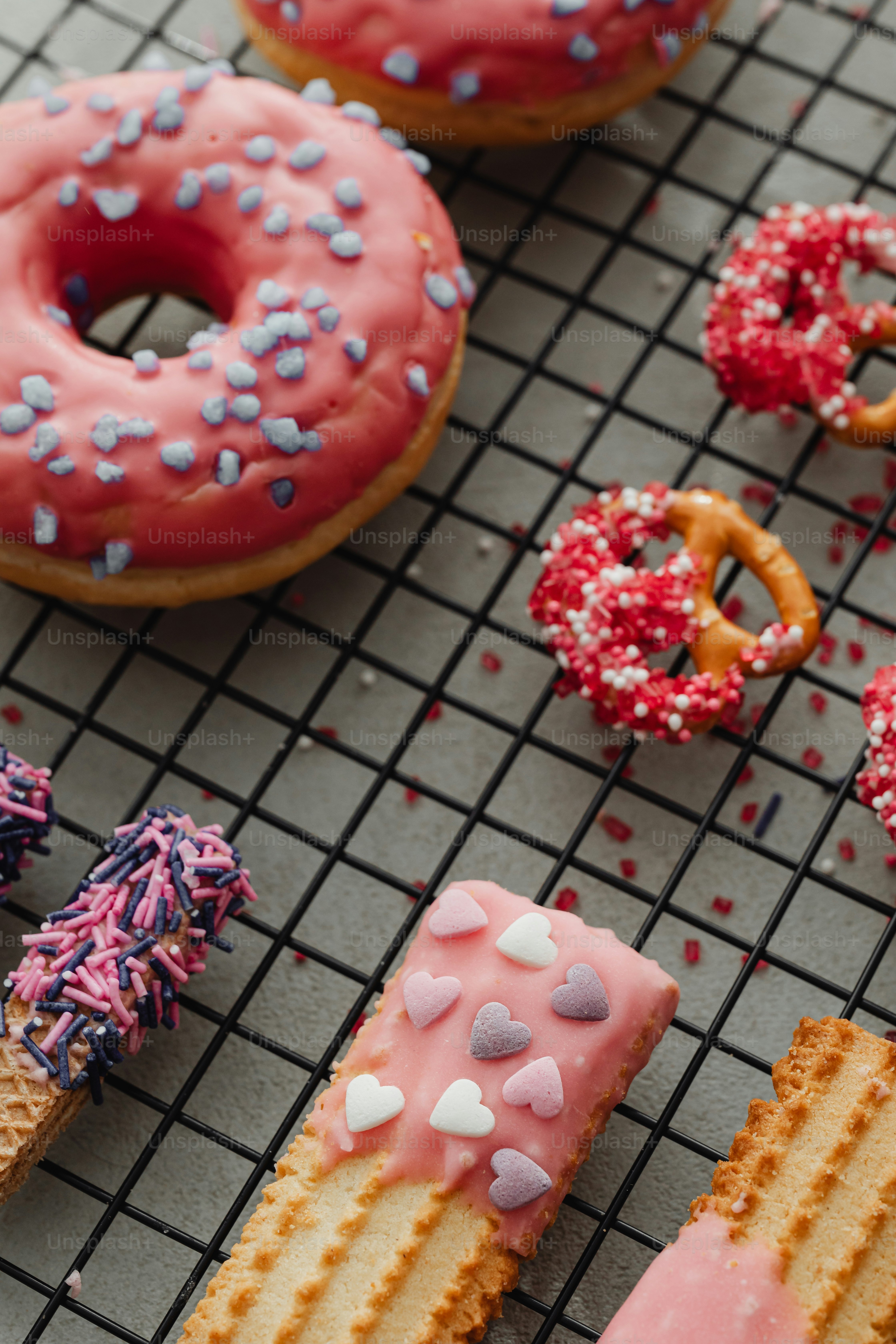 a couple of doughnuts that are on a cooling rack