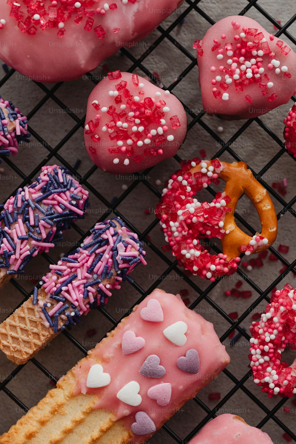 a bunch of doughnuts that are on a rack