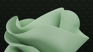 a close up of a green object on a black background