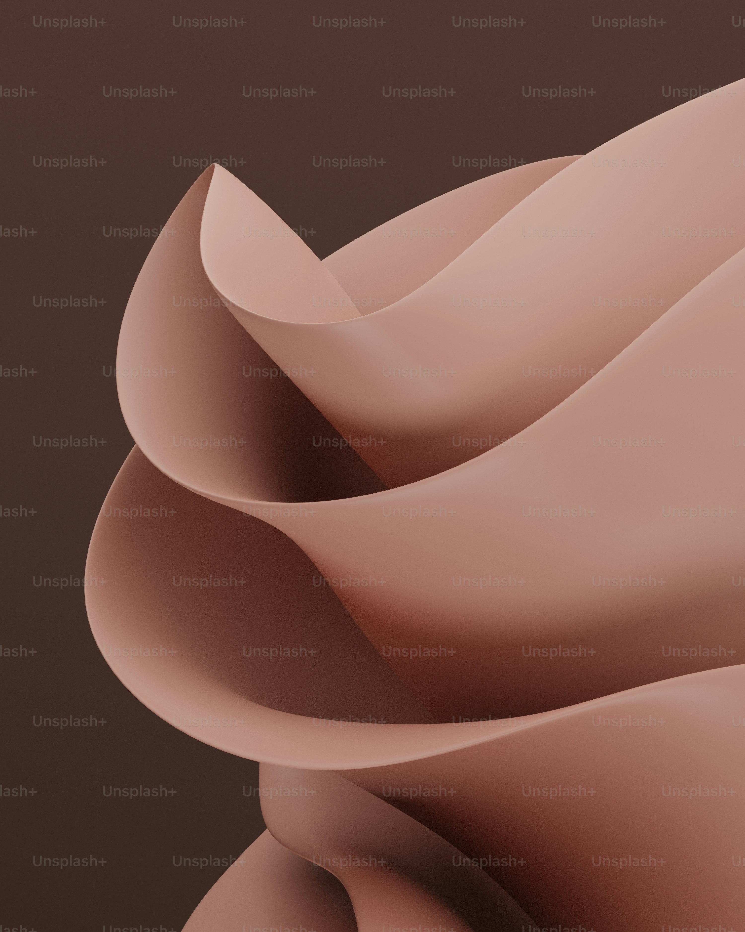 eine Nahaufnahme eines rosa Objekts auf braunem Hintergrund