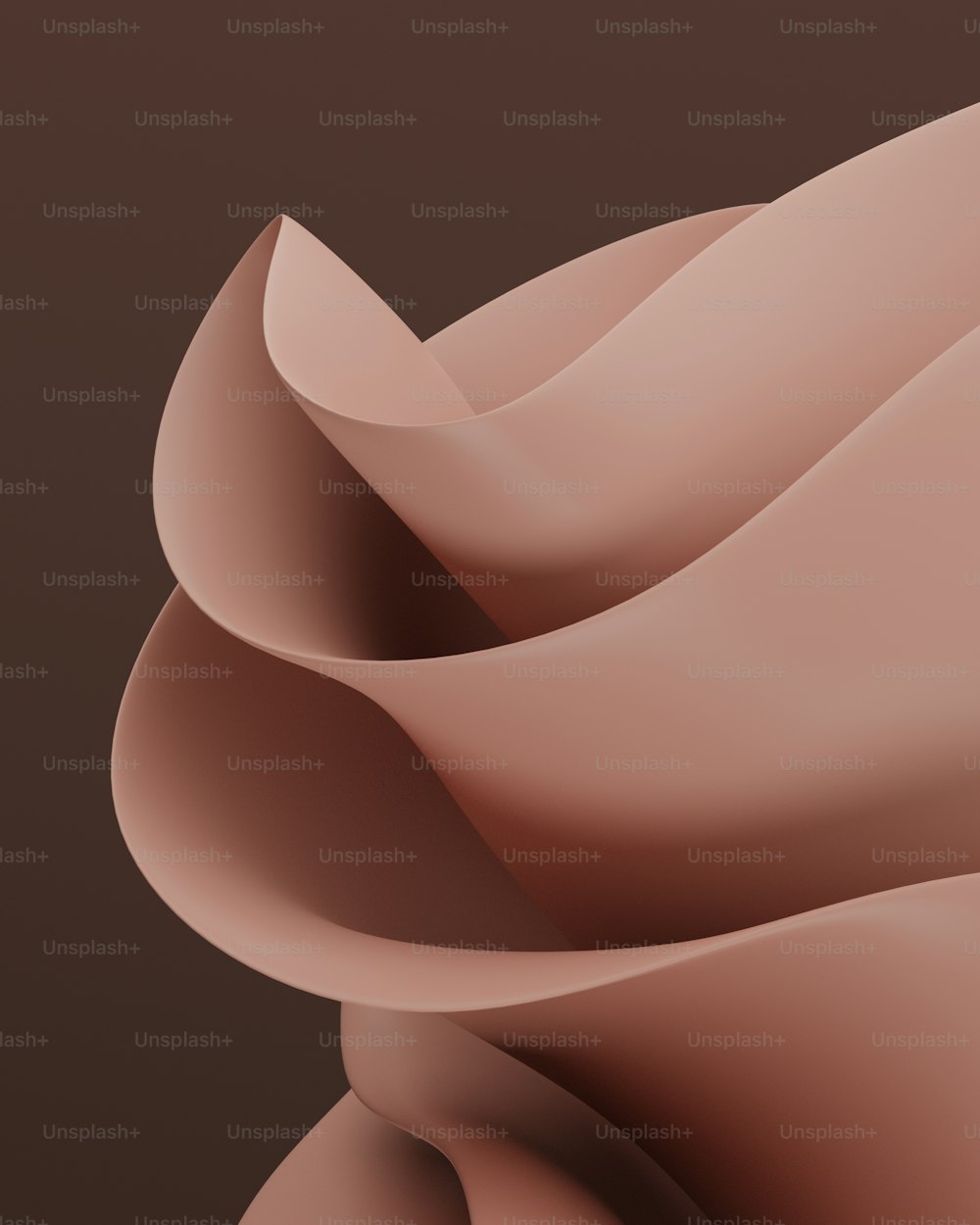 a close up of a pink object on a brown background