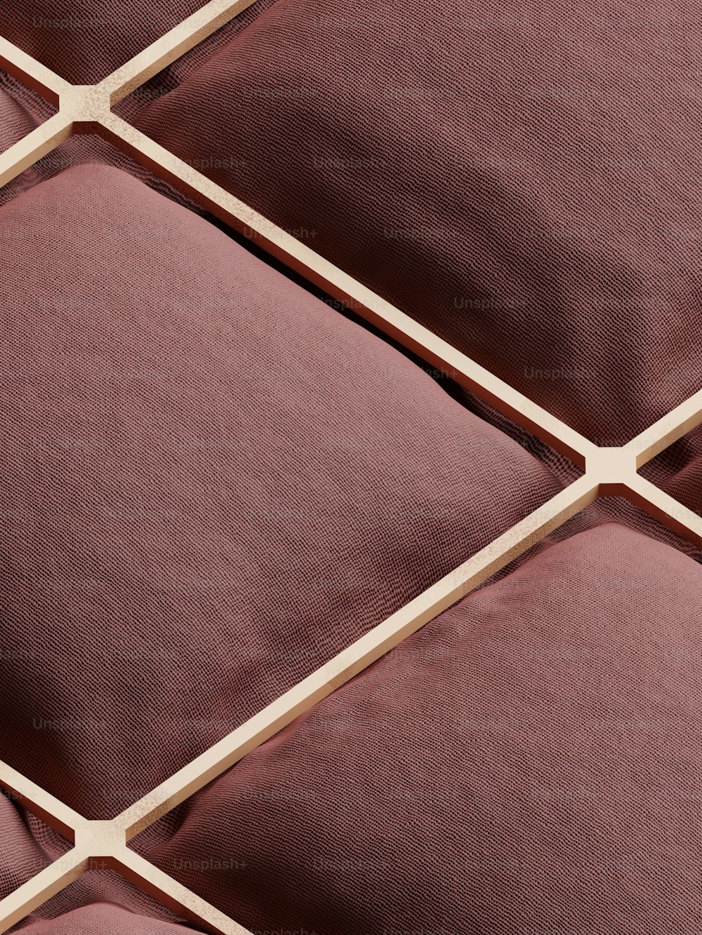 a close up of a brown and white tile pattern