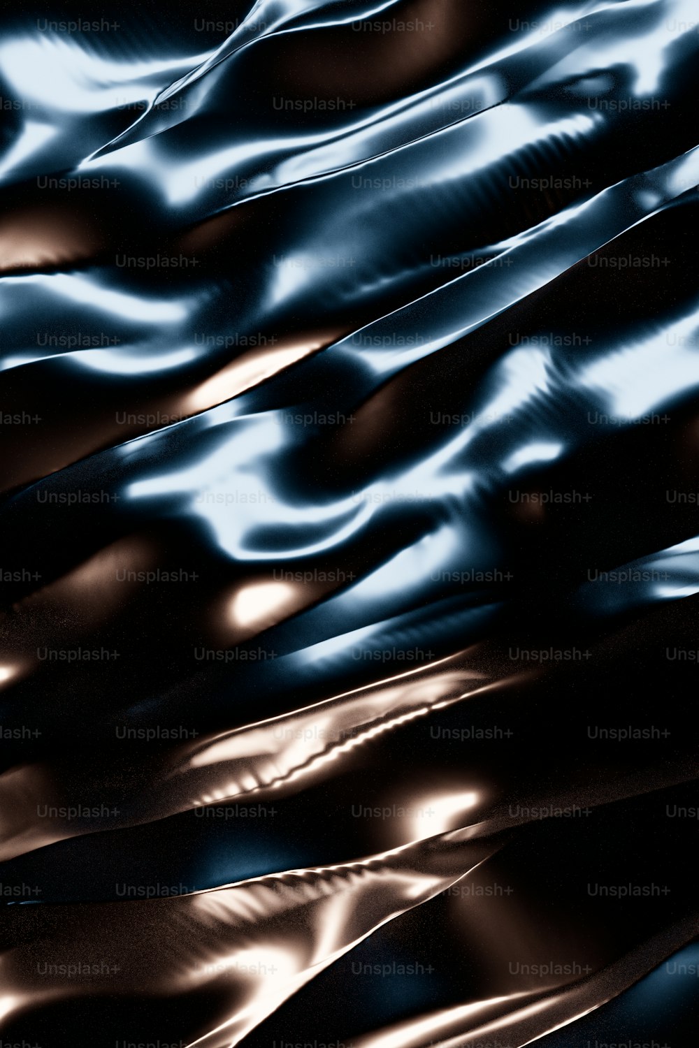 a close up of a shiny metal surface