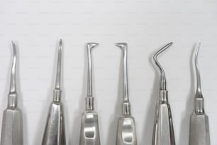 a group of dental instruments sitting next to each other