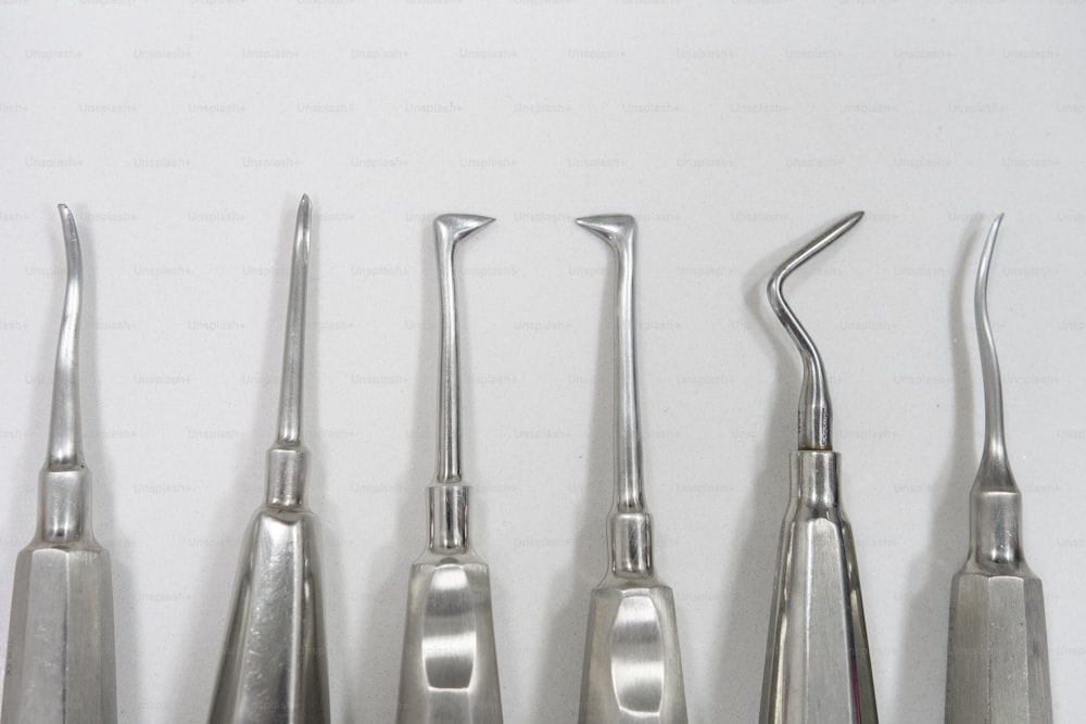 a group of dental instruments sitting next to each other