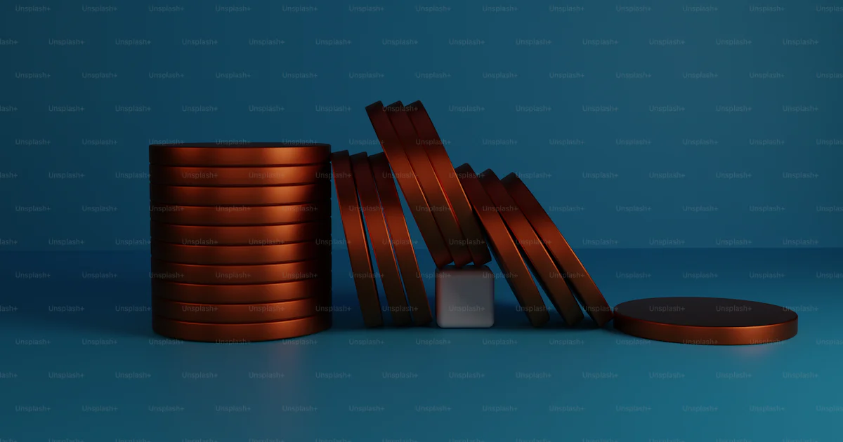 Metal Disc Stack A stack of metal discs sitting next to each other photo – Wallpaper ...