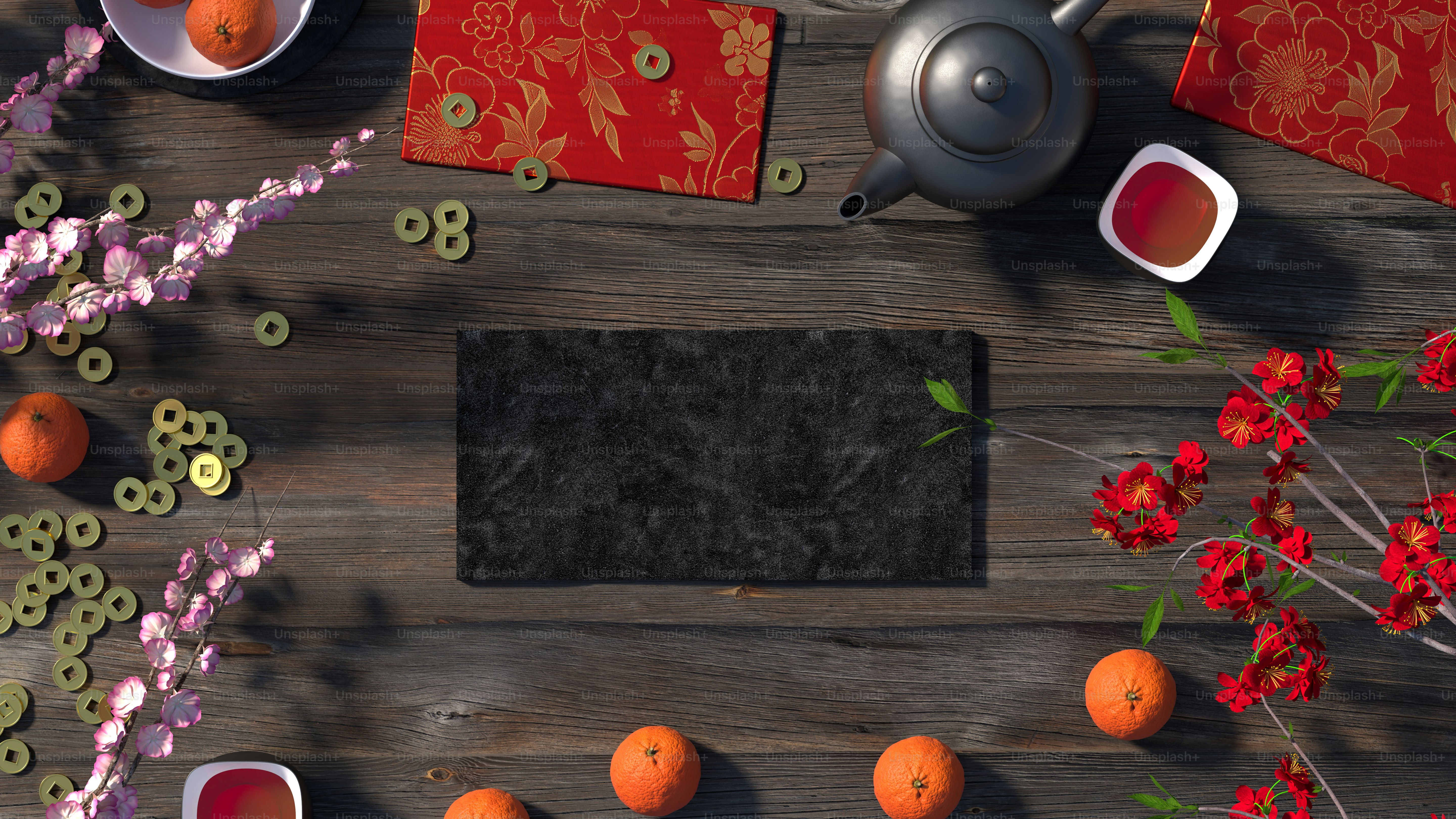 オレンジとティーポットをトッピングした木製のテーブル