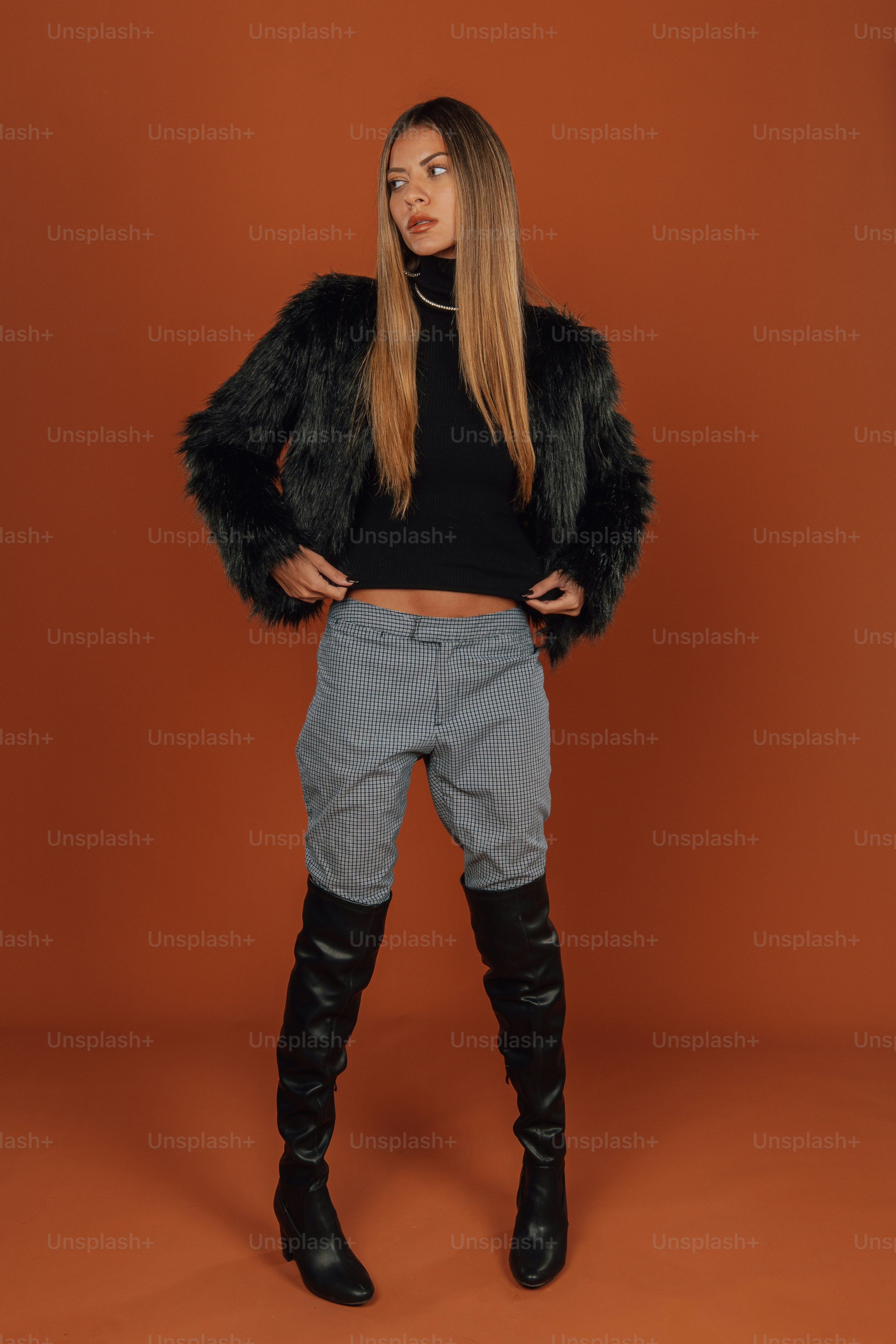Woman wearing Beatnix Costume Shop rave bodysuits styled with faux fur accessories at a festival